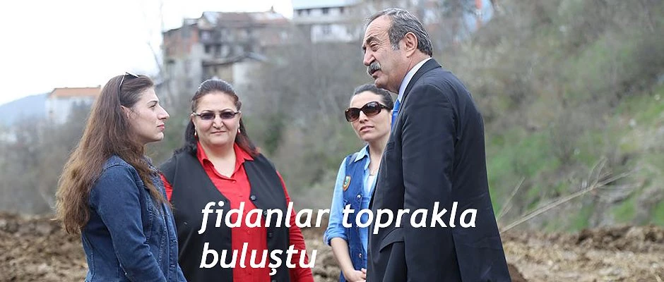 YÖRESEL MEYVE FİDANLARINI TOPRAKLA BULUŞTURDU